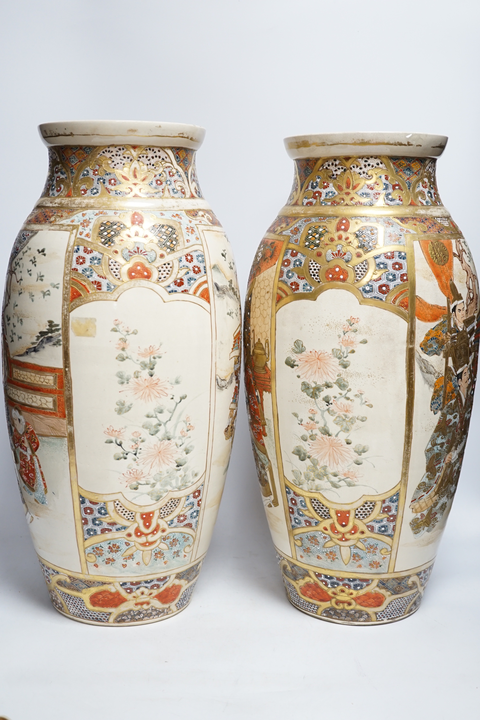 A pair of late 19th century Satsuma ovoid vases and a Satsuma circular fluted dish, (3) vases 47cm high